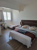 Logement intéressantにあるベッド