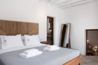 Posteľ alebo postele v izbe v ubytovaní Pure Mykonos Villa