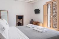 Posteľ alebo postele v izbe v ubytovaní Pure Mykonos Villa