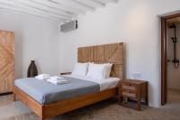 Posteľ alebo postele v izbe v ubytovaní Pure Mykonos Villa