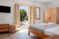 Posteľ alebo postele v izbe v ubytovaní Pure Mykonos Villa