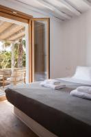 Posteľ alebo postele v izbe v ubytovaní Pure Mykonos Villa