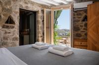 Posteľ alebo postele v izbe v ubytovaní Pure Mykonos Villa