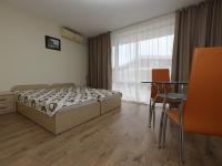 Postel nebo postele na pokoji v ubytování Grand Resort