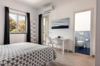 Posteľ alebo postele v izbe v ubytovaní Villa A_Mare