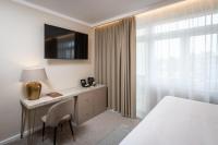 Postel nebo postele na pokoji v ubytování Mamma´s Boutique Hotel