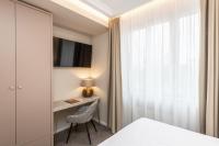 Postel nebo postele na pokoji v ubytování Mamma´s Boutique Hotel