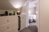 Postel nebo postele na pokoji v ubytování Mamma´s Boutique Hotel