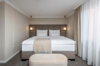Postel nebo postele na pokoji v ubytování Mamma´s Boutique Hotel
