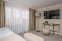 TV a/nebo společenská místnost v ubytování Mamma´s Boutique Hotel