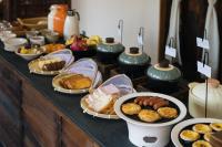 a buffet with different types of food on a table at Hegu Retreat Qingcheng in Jiezi Ancient Town