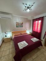 A bed or beds in a room at Il Vicolo Palinuro