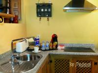 A kitchen or kitchenette at Apartamentos Top Medieval