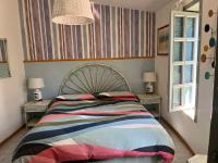 A bed or beds in a room at Villa Federica