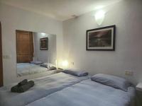 Posteľ alebo postele v izbe v ubytovaní La Orotava vacational rental home