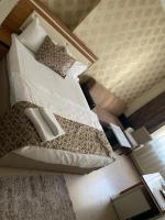 Postel nebo postele na pokoji v ubytování Dimet Park Hotel