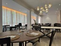 En restaurant eller et andet spisested på Hotel Villa Tosi