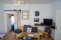 TV a/nebo společenská místnost v ubytování Ferienwohnung Bahnhof Wendehausen