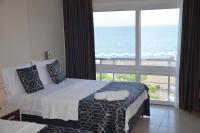 Postel nebo postele na pokoji v ubytování Denizkumu Hotel