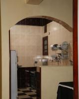 Kuchyň nebo kuchyňský kout v ubytování sun smile guest house᭄ꦿ