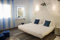 Postel nebo postele na pokoji v ubytování Hotel Pepo