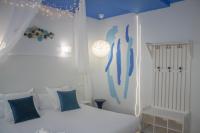 Postel nebo postele na pokoji v ubytování Hotel Pepo