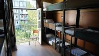 Ein Bett oder Betten in einem Zimmer der Unterkunft Onefam Amstel