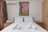 Posteľ alebo postele v izbe v ubytovaní Elvita Athens Sea View Maisonette