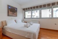 Posteľ alebo postele v izbe v ubytovaní Elvita Athens Sea View Maisonette