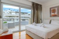 Posteľ alebo postele v izbe v ubytovaní Elvita Athens Sea View Maisonette