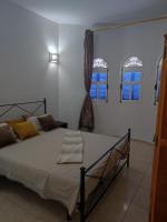 Postel nebo postele na pokoji v ubytování Résidence SUN SHINE DJERBA