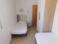 Postel nebo postele na pokoji v ubytování GMID IMMO Apartment Mont Caliu