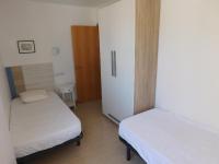 Postel nebo postele na pokoji v ubytování GMID IMMO Apartment Mont Caliu