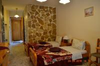 Posteľ alebo postele v izbe v ubytovaní Apartments Zoumperi
