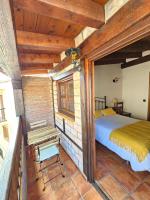 Posteľ alebo postele v izbe v ubytovaní Casa Rural El Campanario