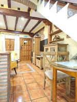 Televízia a/alebo spoločenská miestnosť v ubytovaní Casa Rural El Campanario