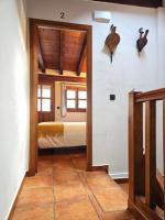 Posteľ alebo postele v izbe v ubytovaní Casa Rural El Campanario