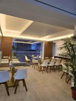 Posezení v ubytování Royal Regent Suites Dhaka