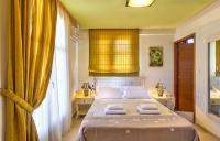 Posteľ alebo postele v izbe v ubytovaní Exclusive Crete Villa Villa Citrus 3 Bedroom Private Pool Rethymnon
