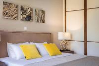 Posteľ alebo postele v izbe v ubytovaní Deluxe Kefalonia Apartment Apartment Hibiscus 3 Bedroom Pool Karavomilos