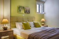 Posteľ alebo postele v izbe v ubytovaní Deluxe Kefalonia Apartment Apartment Hibiscus 3 Bedroom Pool Karavomilos