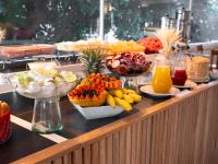 a buffet with fruits and vegetables on a table at Hotel Stil Cartagena in Cartagena de Indias
