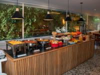 a buffet line with a lot of food on it at Hotel Stil Cartagena in Cartagena de Indias