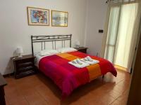 Postel nebo postele na pokoji v ubytování Casa Mare San Vito Lo Capo