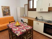 Kuchyň nebo kuchyňský kout v ubytování Casa Mare San Vito Lo Capo