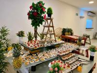 a buffet of cupcakes and desserts on a table at Hotel Dorado Plaza Bocagrande - All Inclusive in Cartagena de Indias