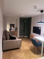 TV a/nebo společenská místnost v ubytování Costa Apartments