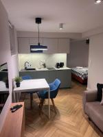 Kuchyň nebo kuchyňský kout v ubytování Costa Apartments