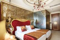 Postel nebo postele na pokoji v ubytování Daru Sultan Hotels Galata
