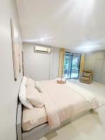 Sun and Moon Houseにあるベッド